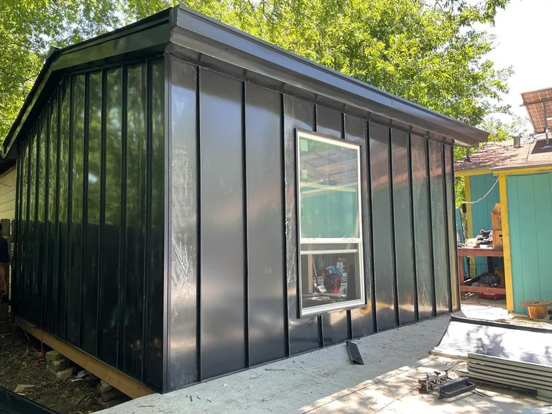 Black standing seam metal wall panels for Metal Roof Installation in Clayton